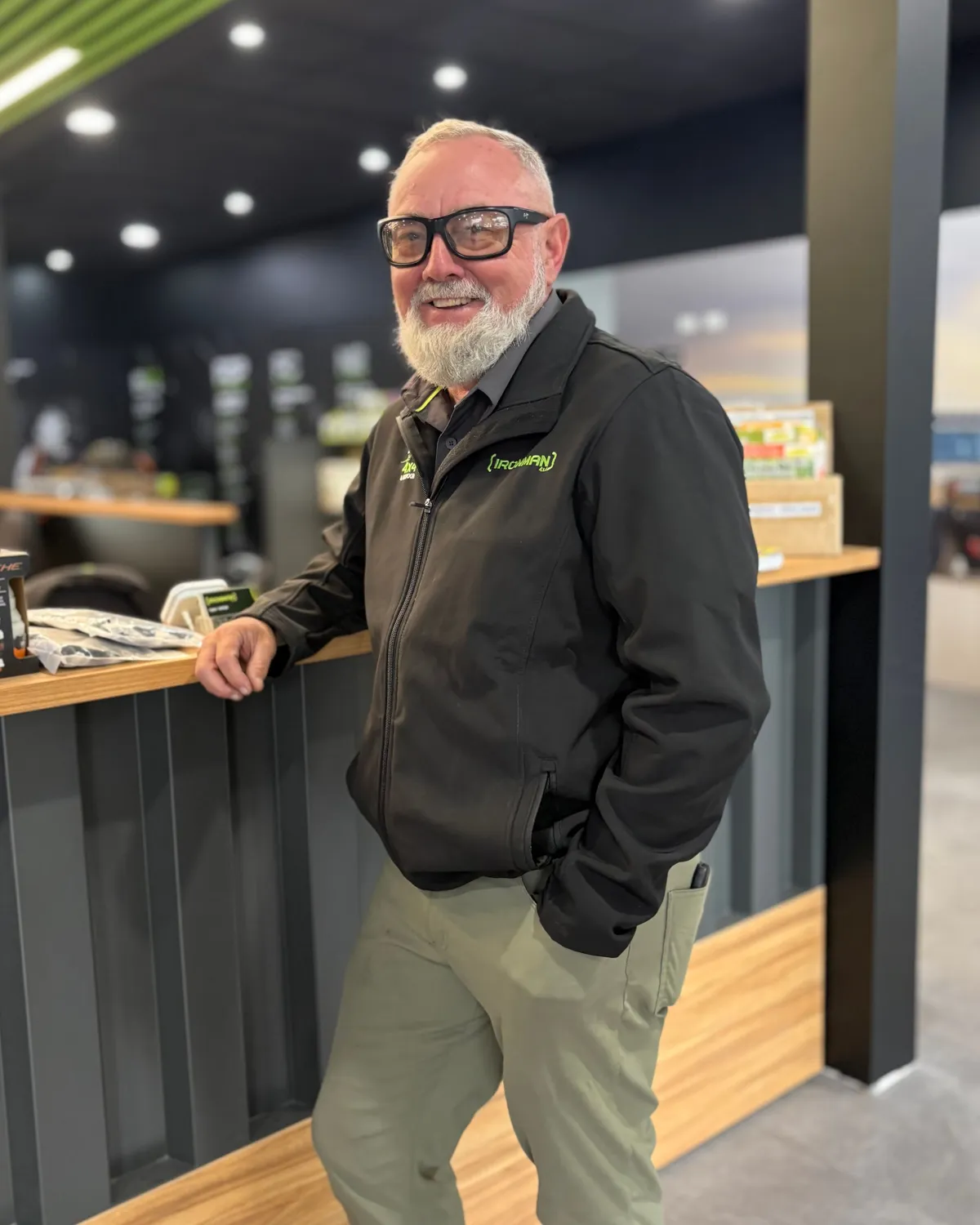 Tony, Director, at the counter in the showroom